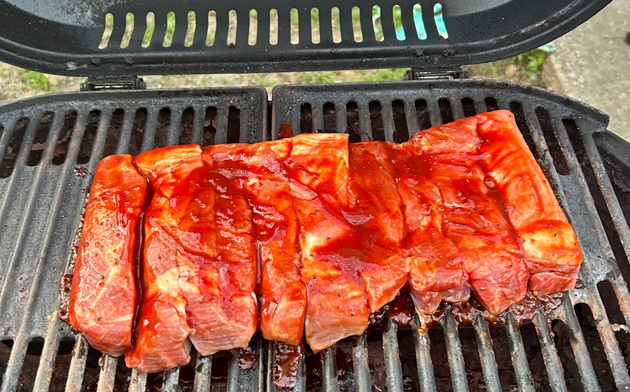 Ribs cooking on a grill